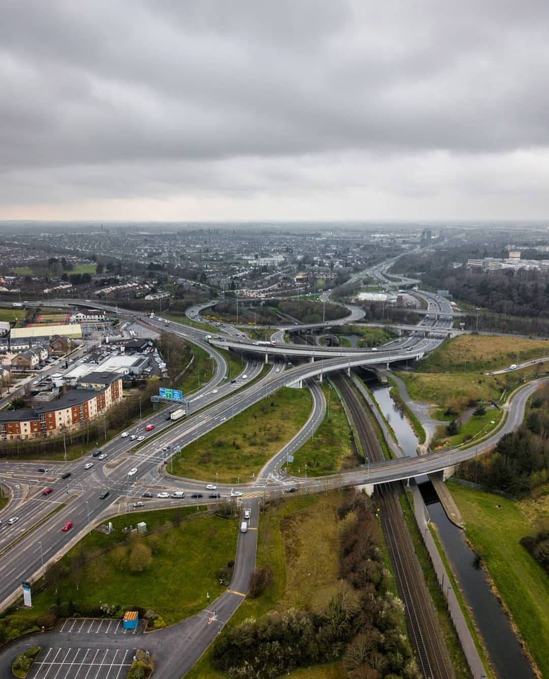 An aerial view of a city featuring a highway transportation system.