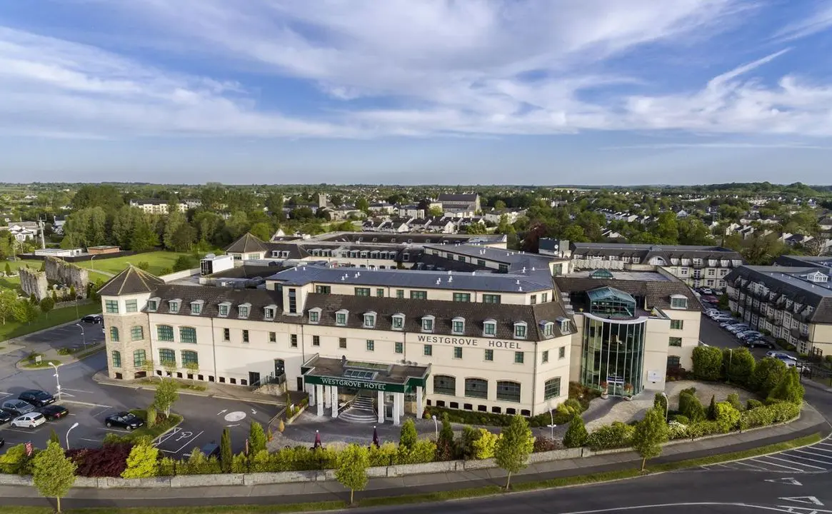 An aerial view of a hotel in Ireland, expertly showcasing its breathtaking surroundings and exceptional architecture.