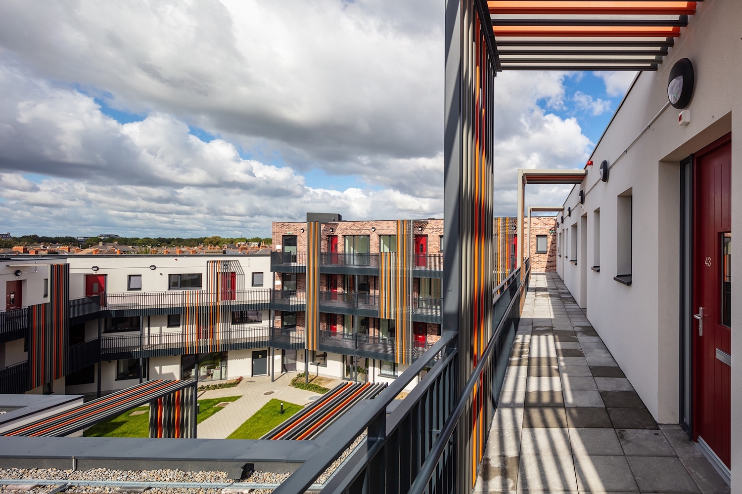 A balcony on a building with a view of a cloudy sky. Offering expert removals services for all your moving needs.