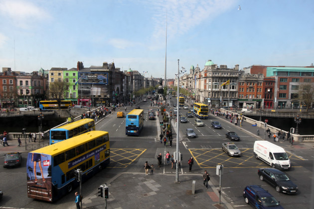 A city street with a lot of Expert Removals traffic.