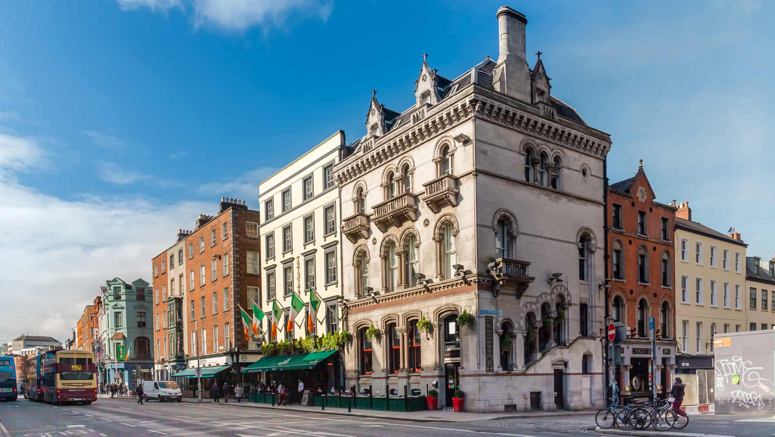 A city street in Dublin with an Expert Removals building in the background.